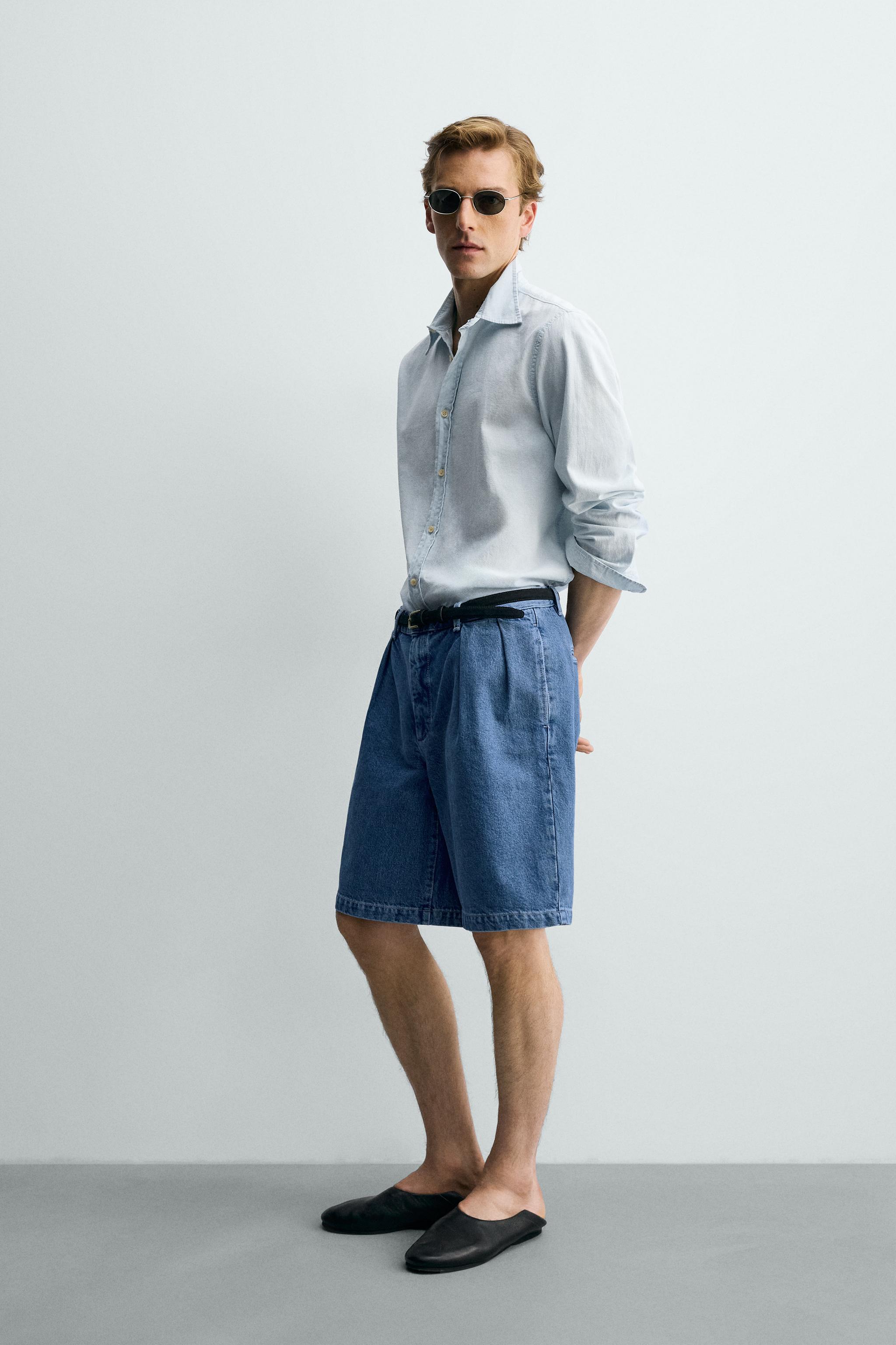 RELAXED FIT PLEATED DENIM SHORTS